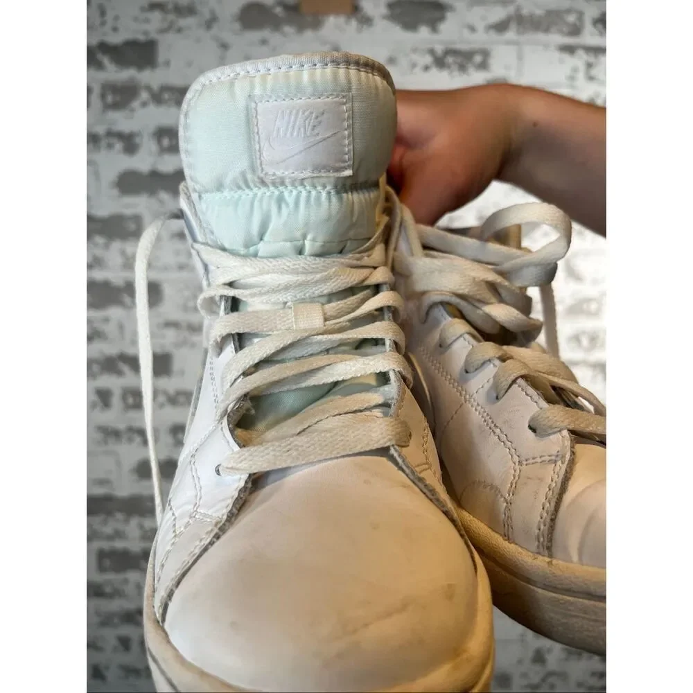 Nike | women white leather high top shoes